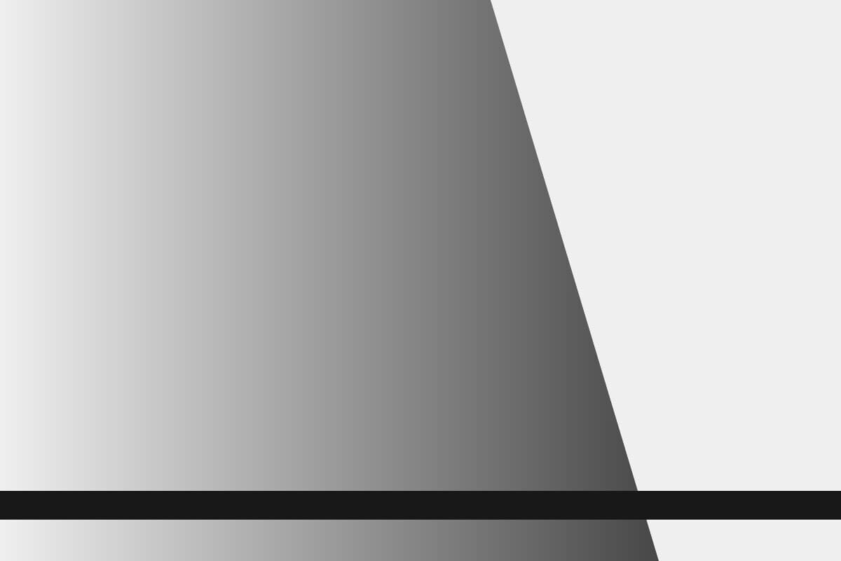 Abstract grayscale cover for: Long-context pricing dropped again, and the economics of RAG shifted with it
